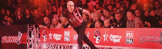 Professional bowler with crowd in in the background
